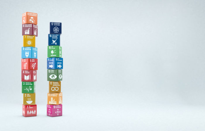 3D boxes with sustainable development goals 2030 with copy space